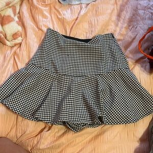 A white and black skirt worn 2 times